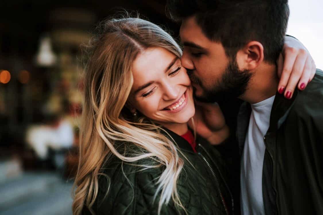 Breath of Fresh Air - Young Lovers Smiling and Embracing